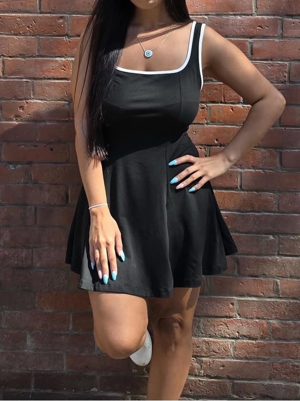 Black Sleeveless Fit-and-Flare Dress with White Trim
